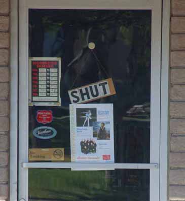 Closed sign says "Shut" 