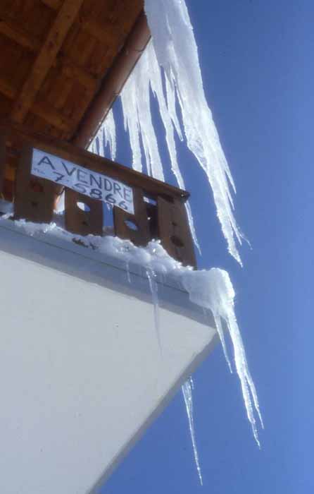 icicles hang from a roof in Verbier
